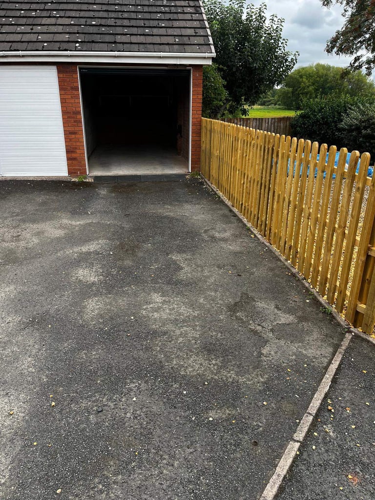 Electric included. Large garage with driveway and roof space.