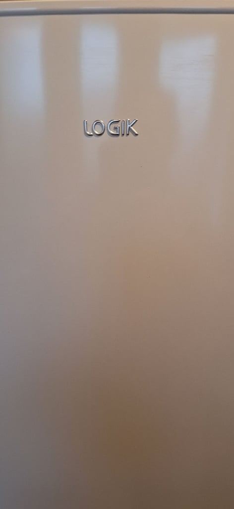 LOGIK fridge freezer size  H 142cm like new one year old 