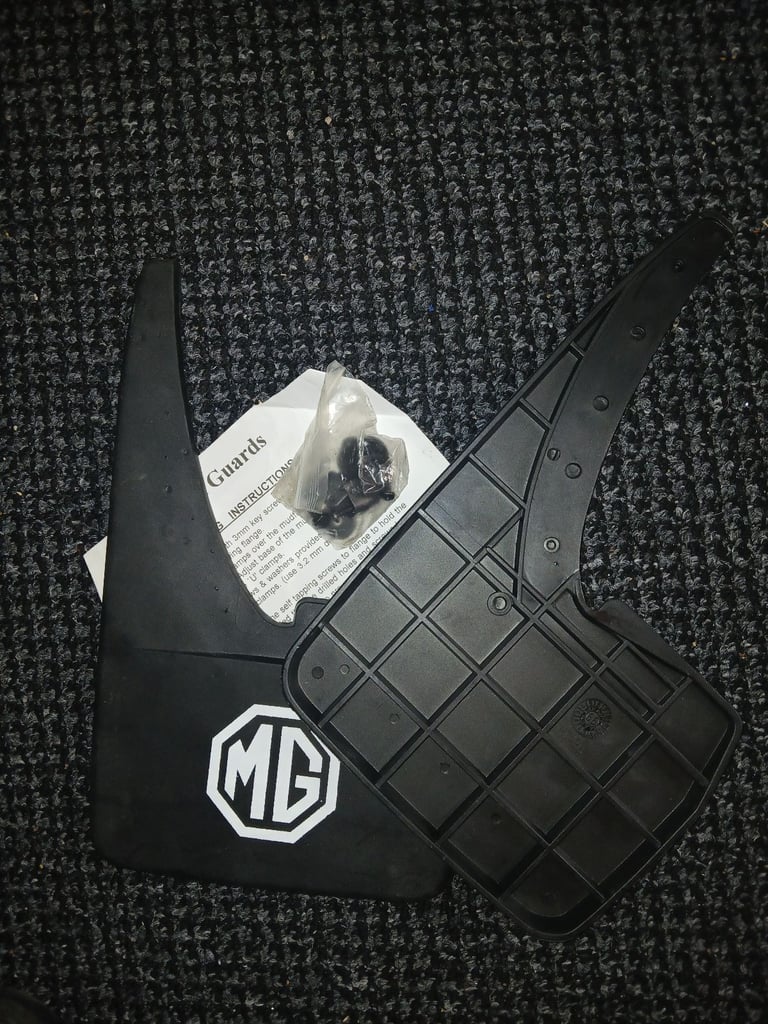 2 sets of MG mudflaps