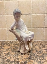 Lladro figurine of ‘Little Boy Thinking’. 