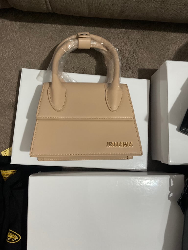 Assortment of designer women’s handbags