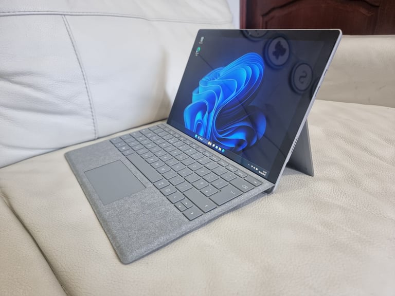 Microsoft Surface Pro 5. i7 7660U, 16GB RAM, 1TB NVME.
