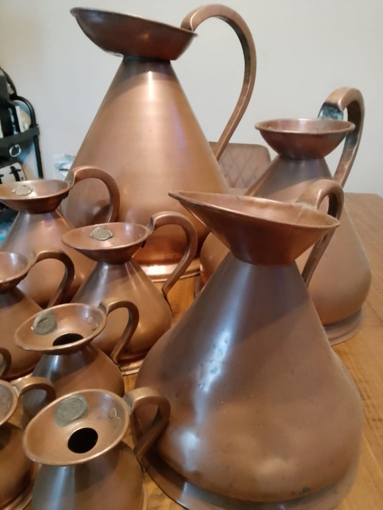 Vintage copper brass measure jug collection