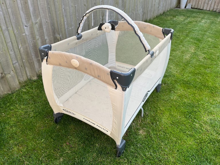 Graco petite cheap travel cot