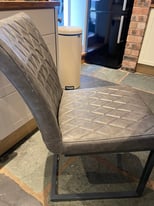 Leather grey chairs 