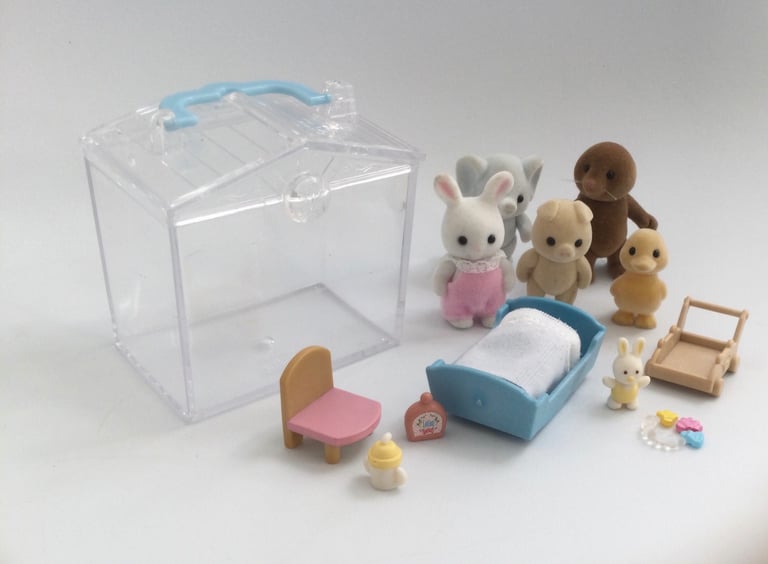 Bundle of Sylvanian Families babies with carry case, crib, walker, accessories 