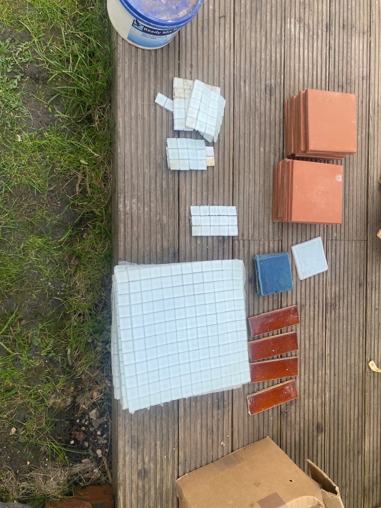 Tiles assortment of glass mosaic, terracotta and glazed. Would suit mosaic art