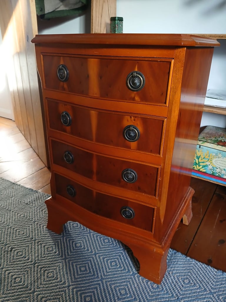 Small set of bow fronted hardwood drawers, good quality. Flamed veneer finish.