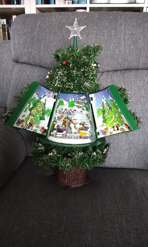 image for Santa's Secret Tree. Magical animated light-up opening Christmas tree.