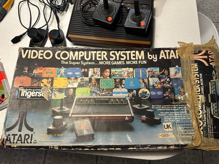 Atari 2600 Woody Game Console With 4 Controllers and multiple games - Untested