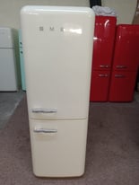 Lovely cream Smeg fab32 fridge freezer. Full warranty. Can deliver.
