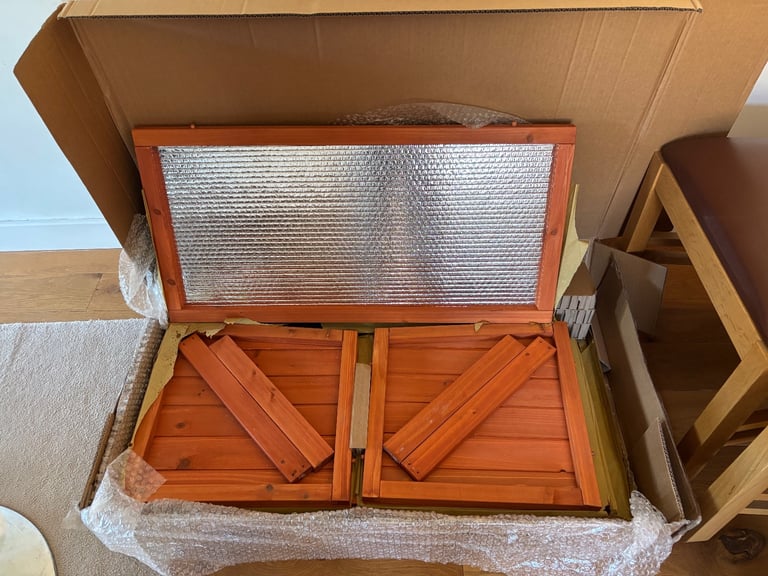 Brand new cat shelter box ready to assemble