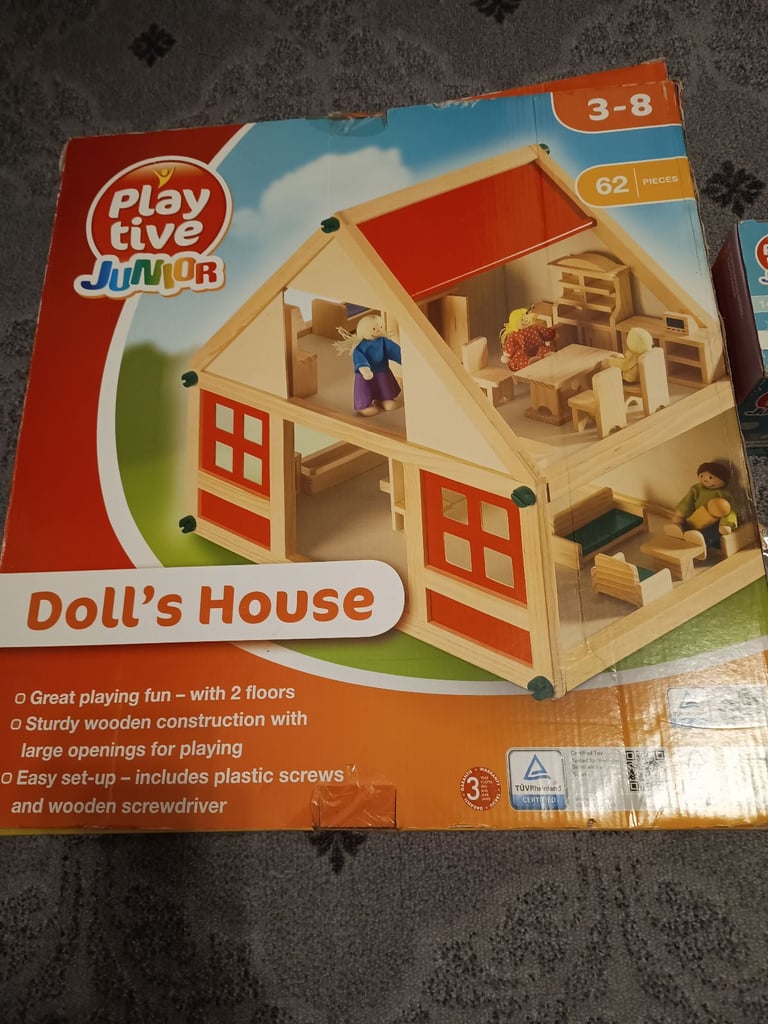 Brand new wooden doll house with furniture and dolls 