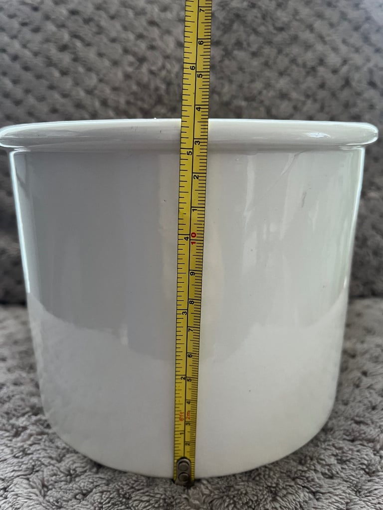 White ceramic jar with lid