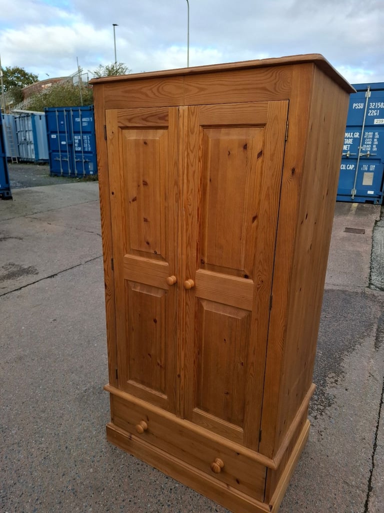 Pine double wardrobe with drawer
