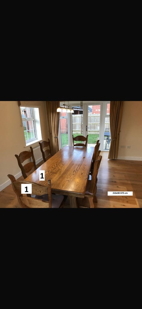image for Oak dining table and chairs 