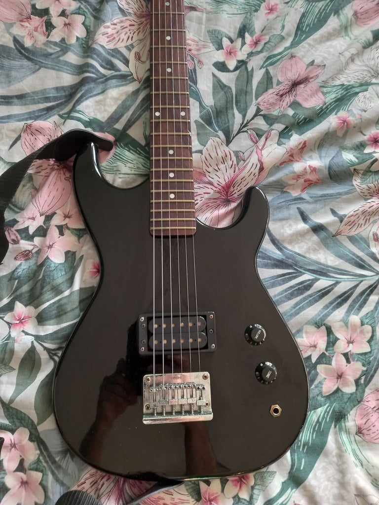 Vintage 1980s Encore single humbucker electric guitar. 
