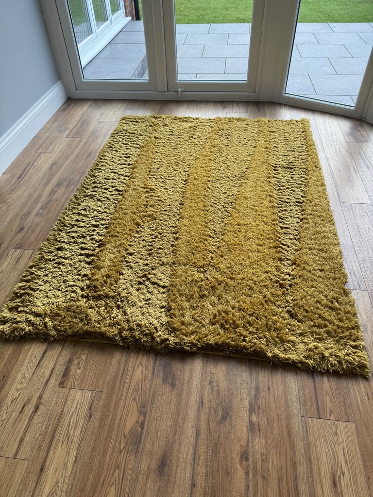 Next gold / mustard / yellow rug