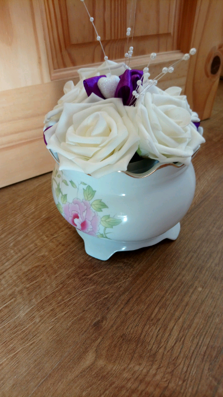 Vintage Pottery Vase with artifical flowers 