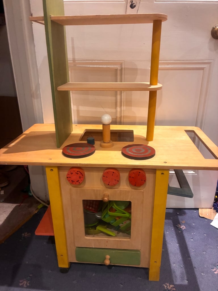 Lovely quality wooden toy play kitchen two sided to include cooker and washing machine used