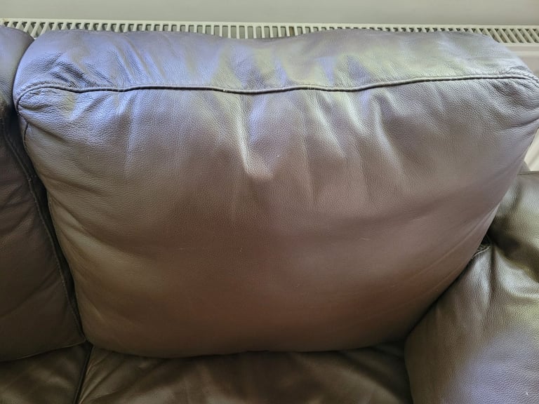 Small brown leather sofa- free