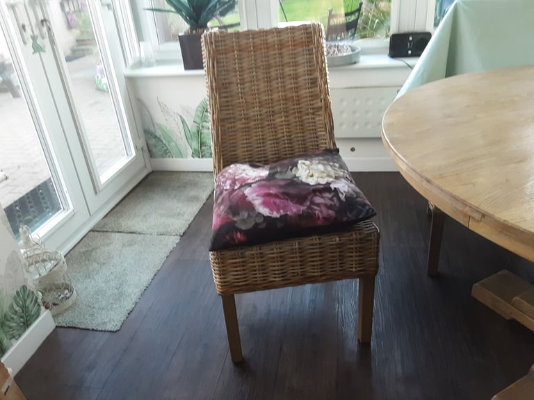 Rattan dining chairs perfect for the  Christmas table