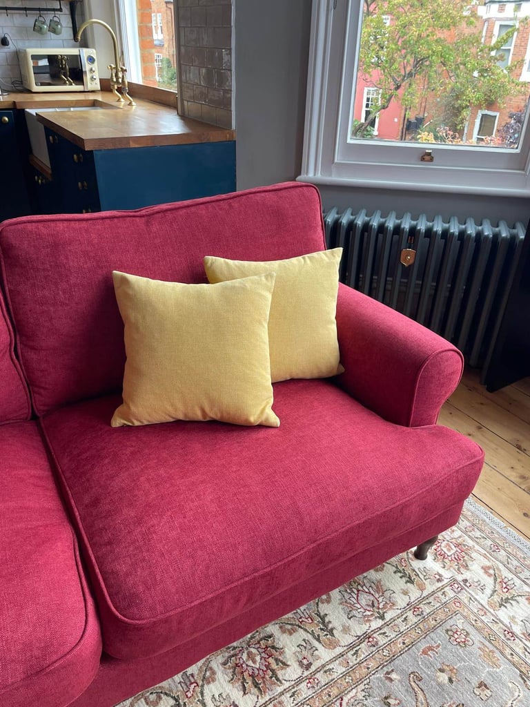 image for Feathered cushions with yellow 100% cotton covers from John Lewis