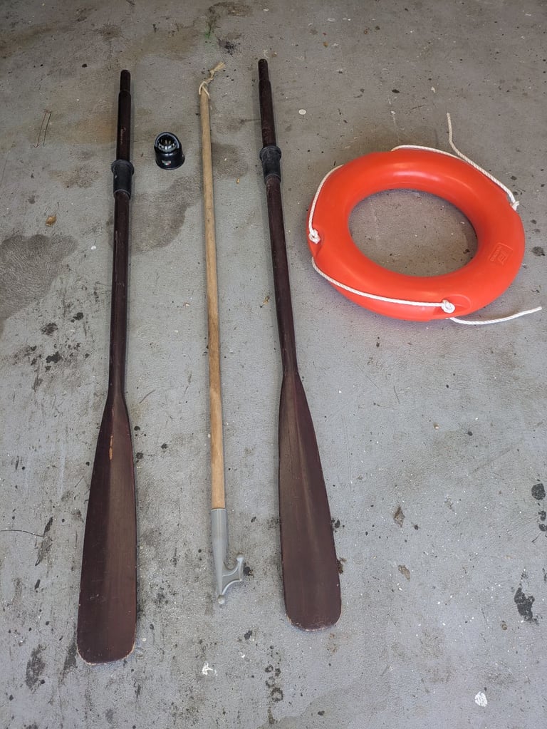 Oars, boat hook, safety ring and compass