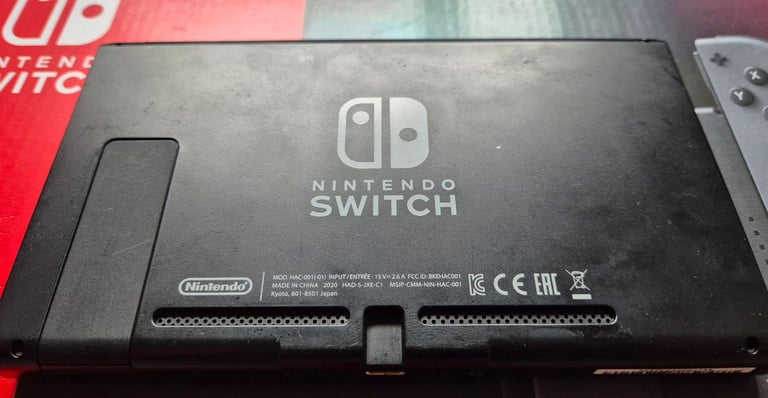 Nintendo Switch Grey with extra controller and 10 games.