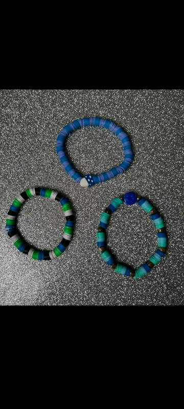 Bracelets any colour's and can add little charms what ever you want al