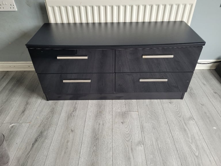 Black solid tv stand with high gloss drawers