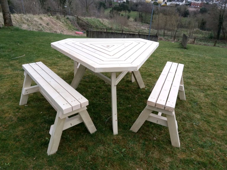 Wooden triangle picnic table and 3 x benches