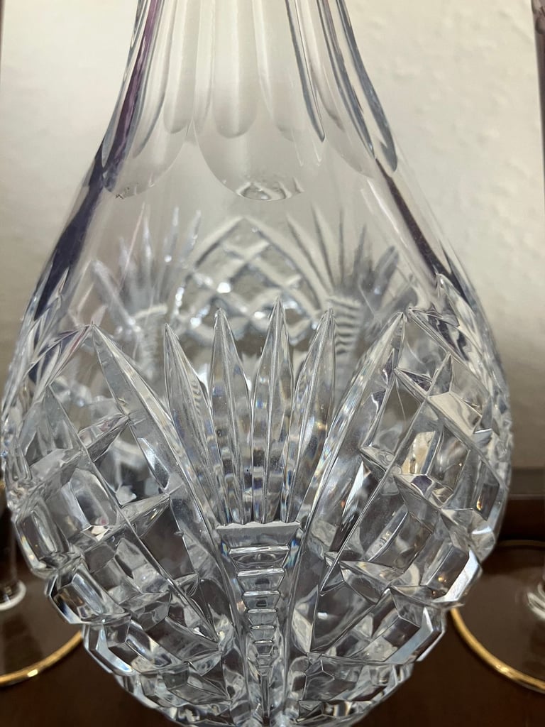 Heavy glass decanter and six vintage wine glasses.