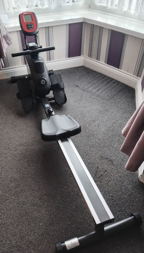 Rowing machine and weights bench