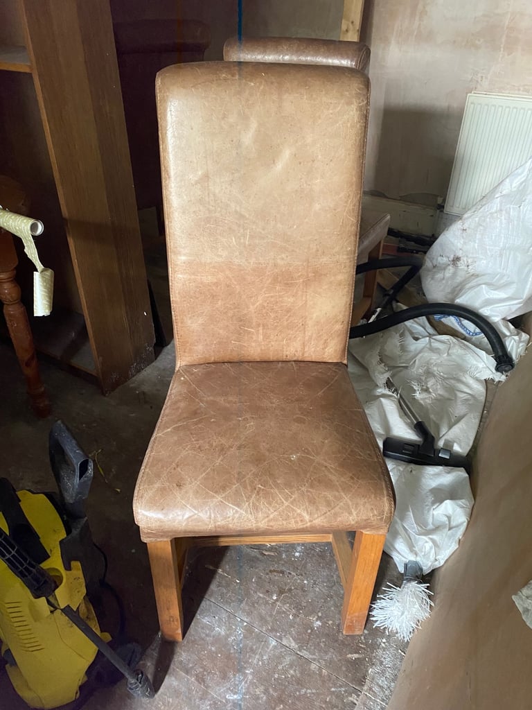 4 Tan leather and wood dining chairs
