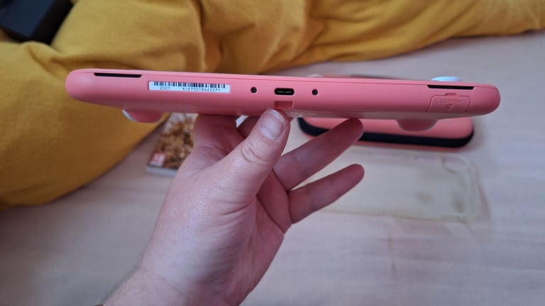 Nintendo switch lite coral pink 