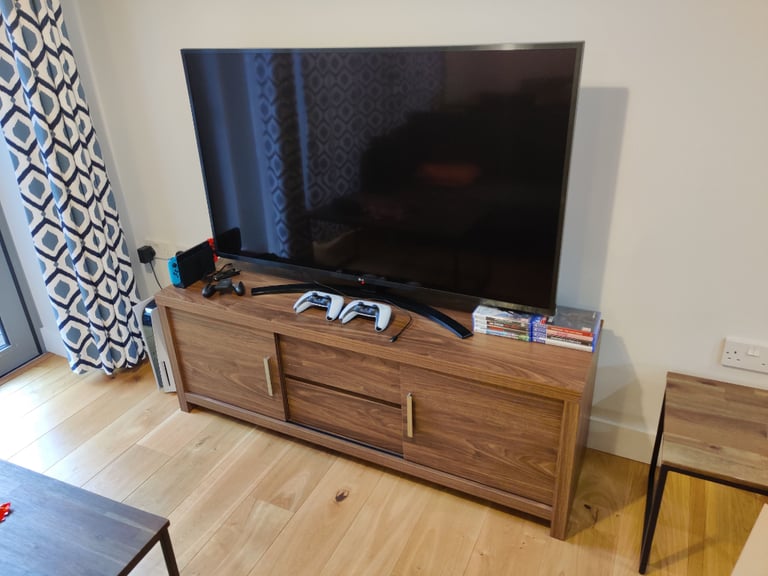 large tv stand with slide doors and drawers 55 H x 40 D x 140 W