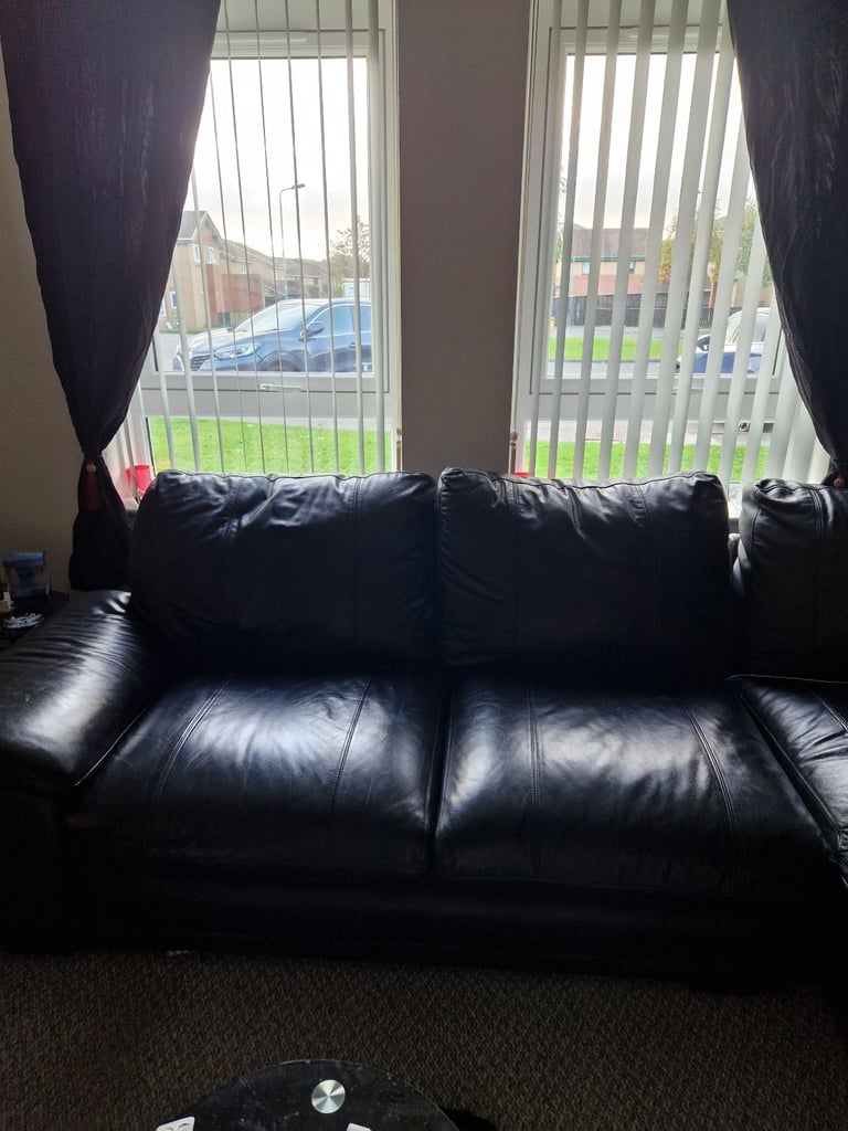 Black leather corner sofa ( SOLD PENDING UPLIFT )