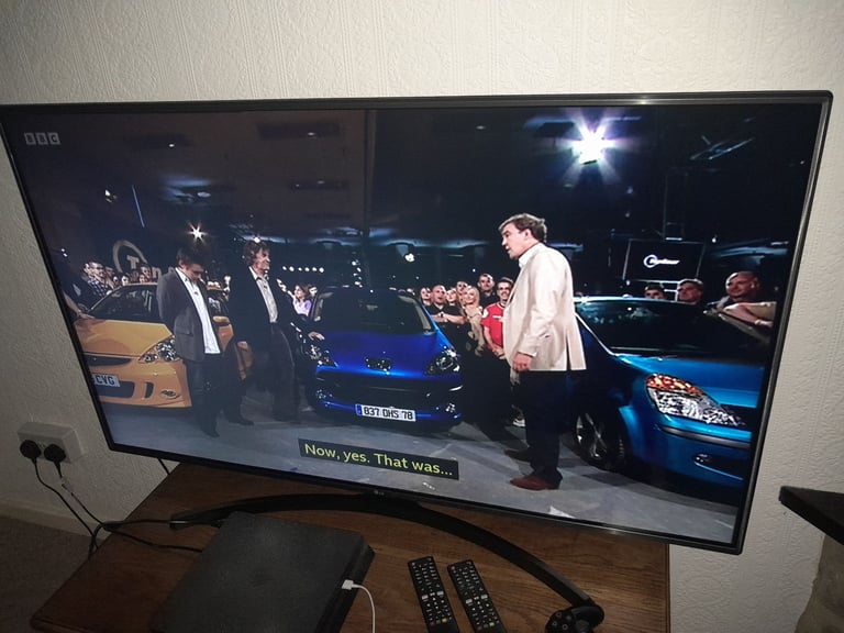 LG 55 inch 4K Ultra HD HDR Smart LED TV with two remotes