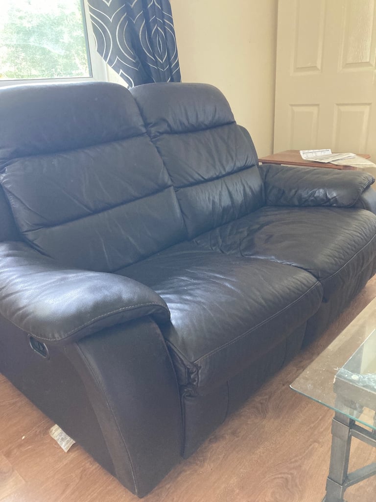 image for Two seater leather sofa with electric pull outs