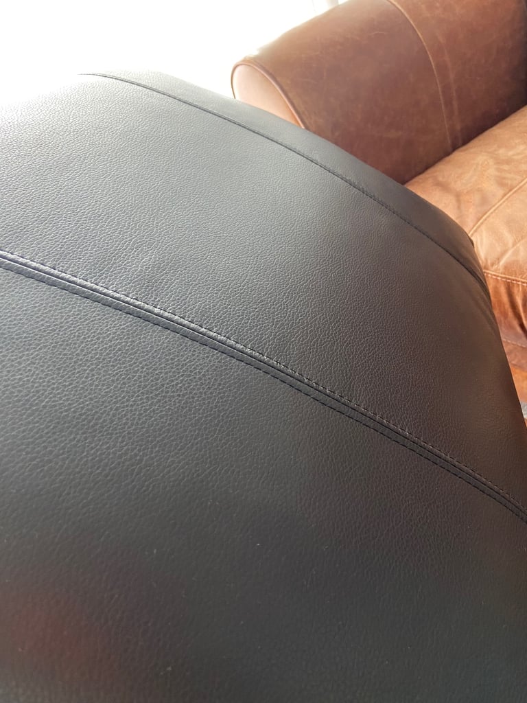 2 firm decorative leather pillows.
