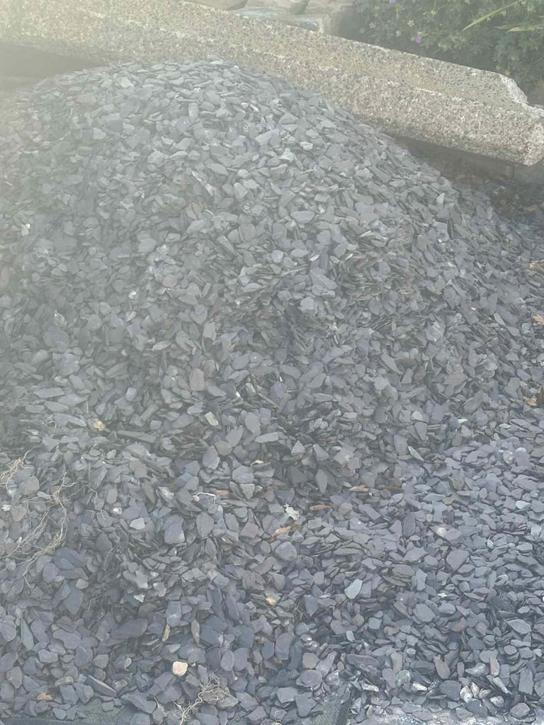 Garden slate. £5 per carrier bag full 