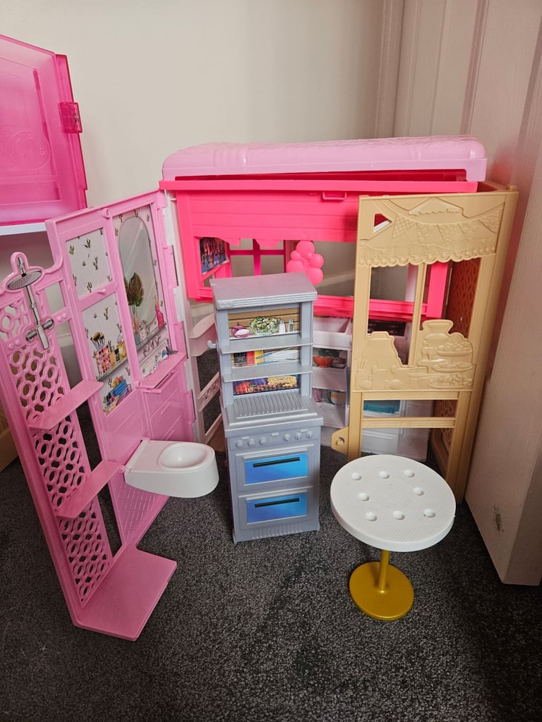 Barbie dreamhouse and barbie bundle