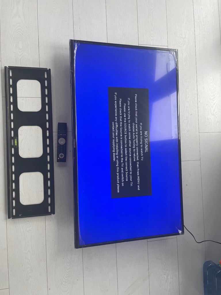 50in tv with remote and wall bracket 