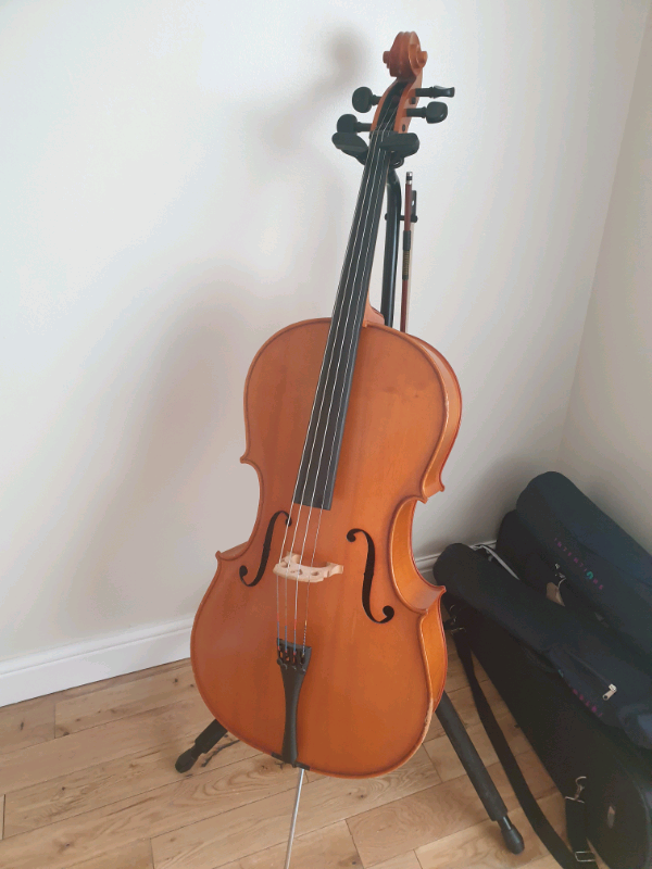 Cello with bow stand and padded case