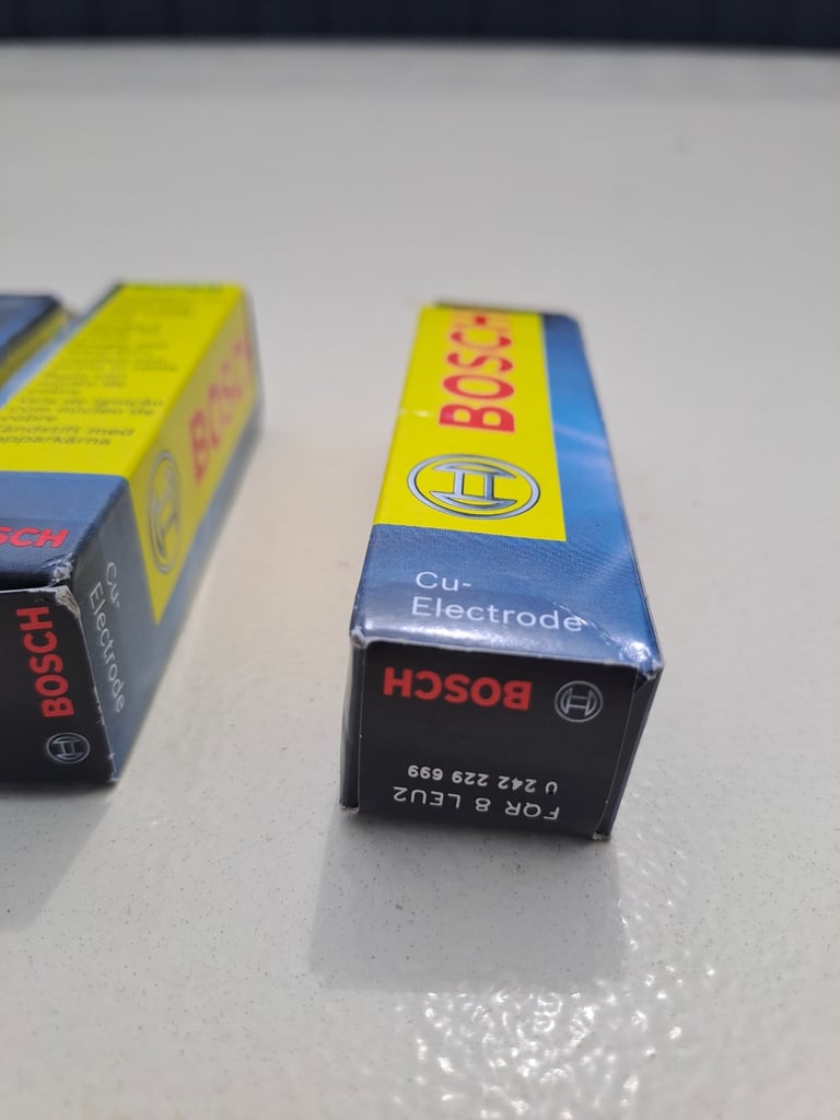 4 x Bosch spark plugs FQR 8 LEU2.  Brand new