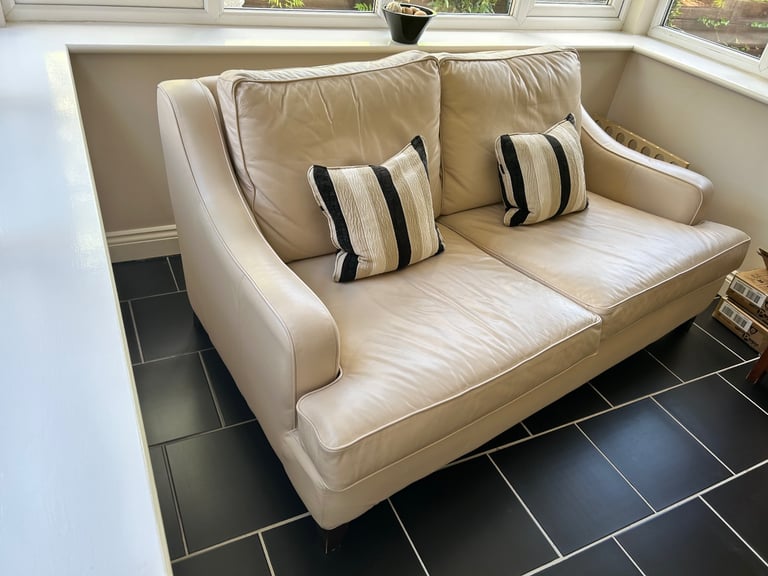 Two seater leather sofa by Multiyork