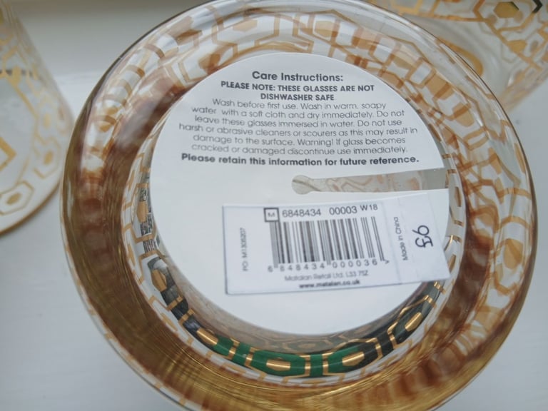 3 lettered glass tumblers with gold style patternation