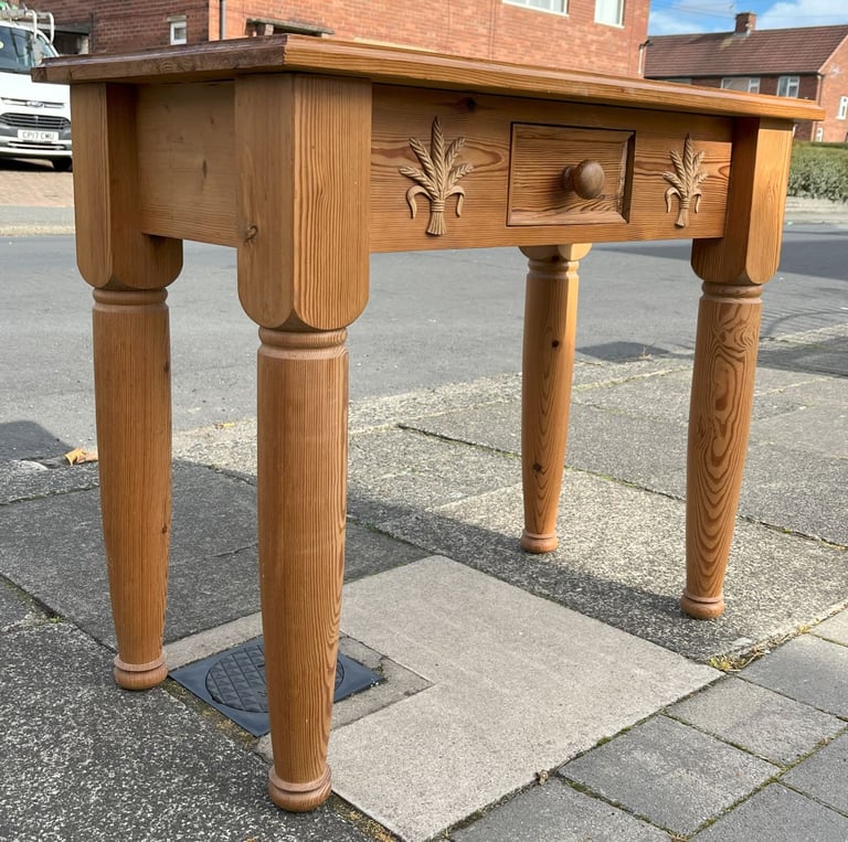 image for A CHUNKY SOLID PINE SIDE TABLE WITH WHEATSHEAF MOULDINGS