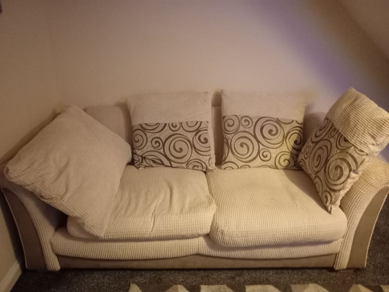 Two piece cream sofa